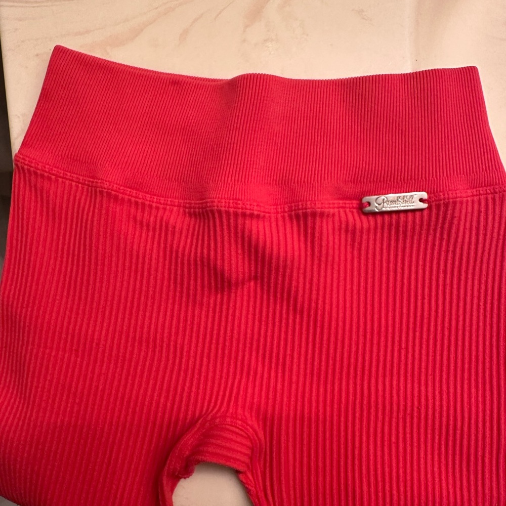Bombshells leggings XS stretch got good use off them bright red very cute